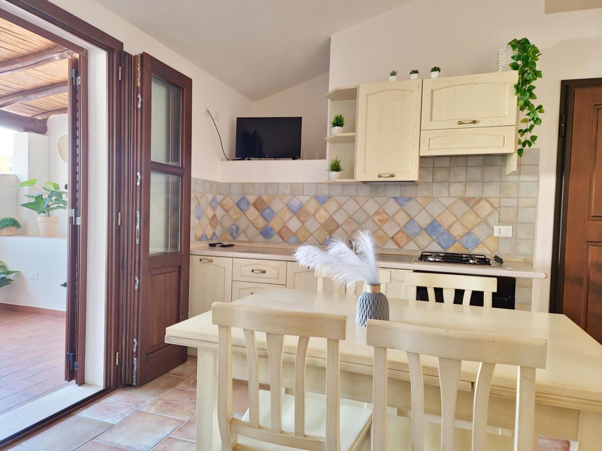 Dommos - Melodie Apartments Cala Liberotto Bagian luar foto