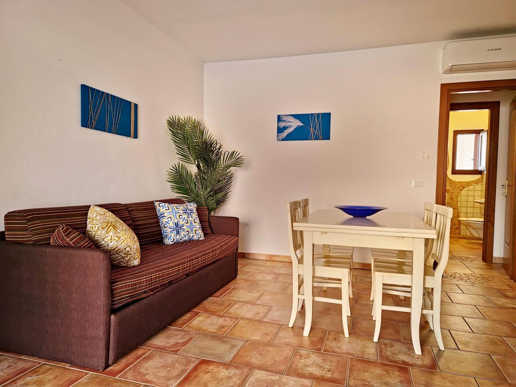 Dommos - Melodie Apartments Cala Liberotto Bagian luar foto